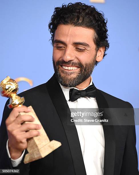 Oscar Isaac poses at the 73rd Annual Golden Globe Awardsat The Beverly Hilton Hotel on January 10, 2016 in Beverly Hills, California.