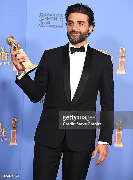 Oscar Isaac poses at the 73rd Annual Golden Globe Awardsat The Beverly Hilton Hotel on January 10, 2016 in Beverly Hills, California.