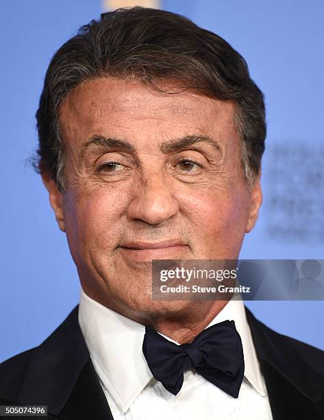 Sly Stallone poses at the 73rd Annual Golden Globe Awardsat The Beverly Hilton Hotel on January 10, 2016 in Beverly Hills, California.