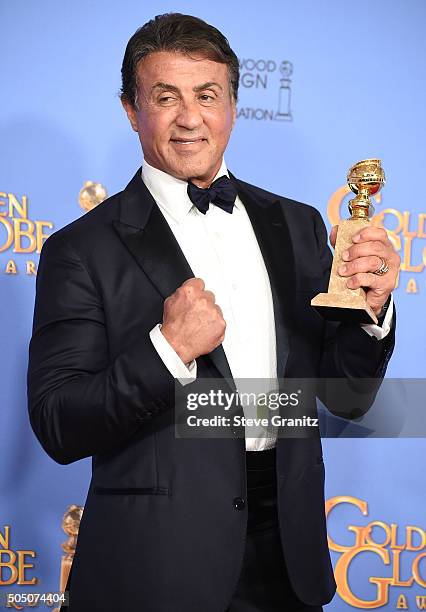 Sly Stallone poses at the 73rd Annual Golden Globe Awardsat The Beverly Hilton Hotel on January 10, 2016 in Beverly Hills, California.
