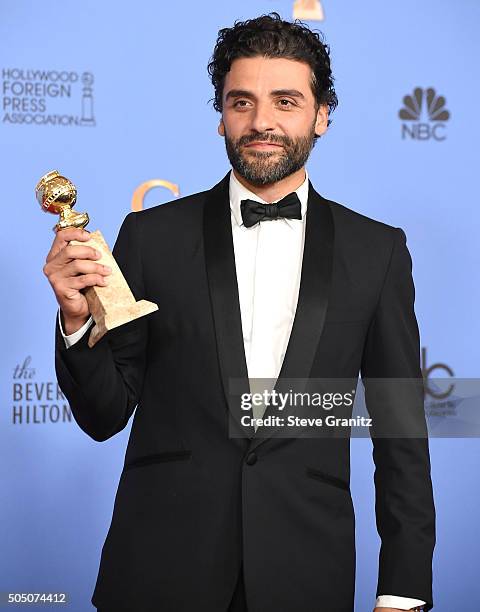 Oscar Isaac poses at the 73rd Annual Golden Globe Awardsat The Beverly Hilton Hotel on January 10, 2016 in Beverly Hills, California.