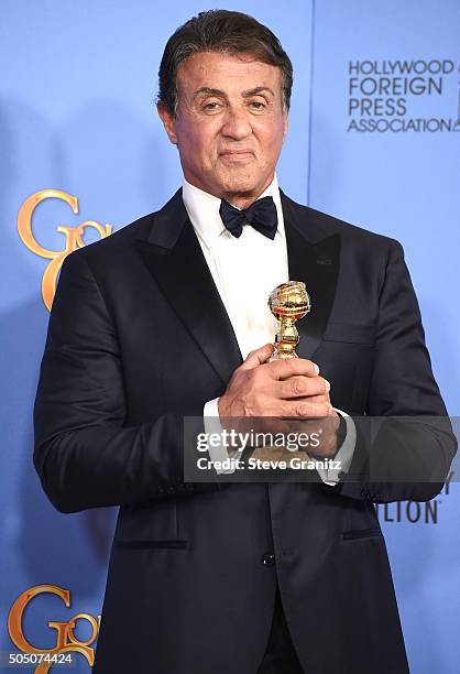 Sly Stallone poses at the 73rd Annual Golden Globe Awardsat The Beverly Hilton Hotel on January 10, 2016 in Beverly Hills, California.