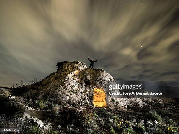 medieval cave excavated in the rock for the man like refuge on the top of a mountain - hollow stock pictures, royalty-free photos & images