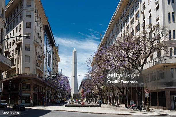 buenos aires, avenida corrientes - obelisco de buenos aires stock pictures, royalty-free photos & images