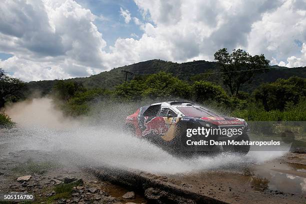 Sebastien Loeb of France and Daniel Elena of Monaco in the PEUGEOT 2008 DKR for TEAM PEUGEOT TOTAL compete on day 13 / stage twelve between San Juan...