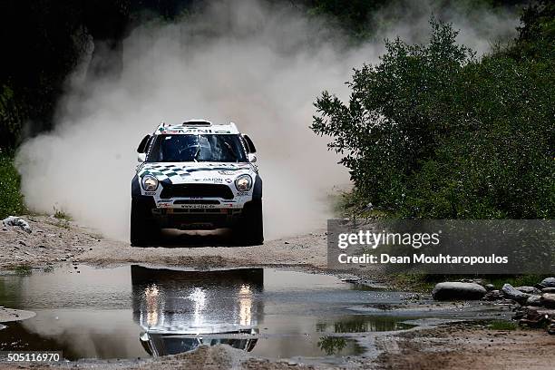 Mikko Hirvonen of Finland and Michel Perin of France in the MINI ALL4 RACING for AXION X-RAID TEAM compete on day 13 / stage twelve between San Juan...