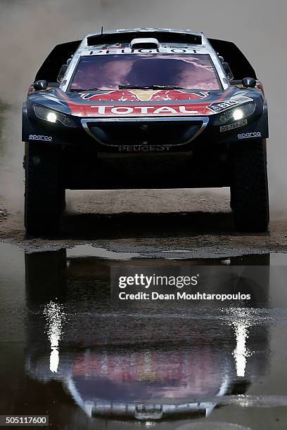 Sebastien Loeb of France and Daniel Elena of Monaco in the PEUGEOT 2008 DKR for TEAM PEUGEOT TOTAL compete on day 13 / stage twelve between San Juan...