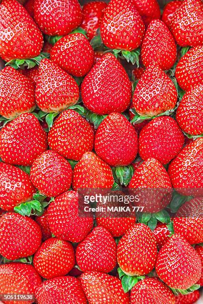 full frame shot of strawberries. - strawberry texture stock pictures, royalty-free photos & images