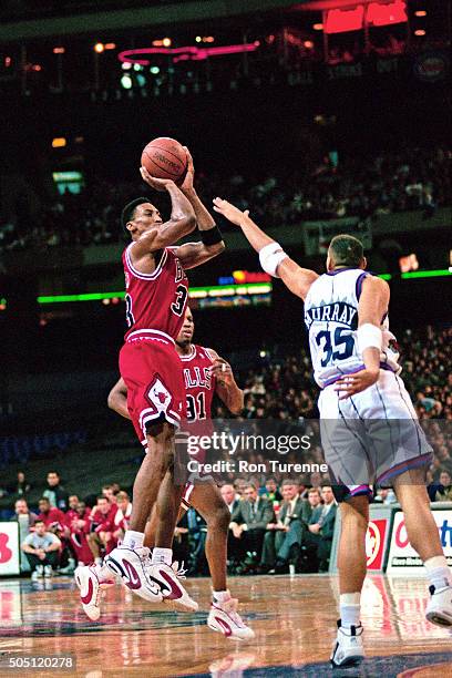 Scottie Pippen of the Chicago Bulls shoots against the Toronto Raptors on January 18, 1996 at SkyDome in Toronto, Canada. NOTE TO USER: User...