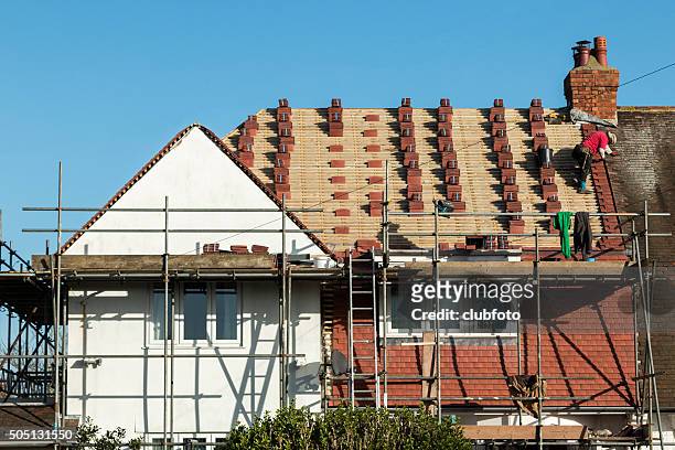 new tiled roof replacement - roof replacement stock pictures, royalty-free photos & images