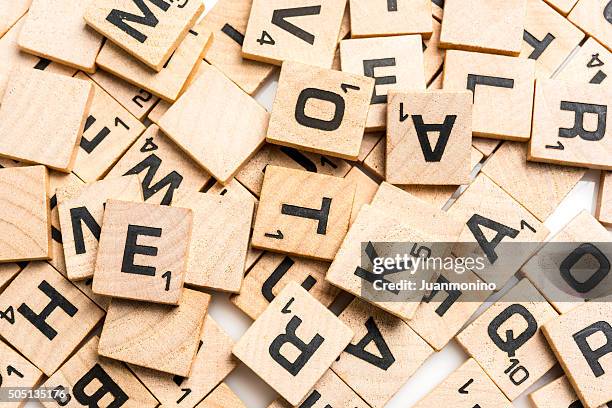 scrabble letters - scrabble stock pictures, royalty-free photos & images