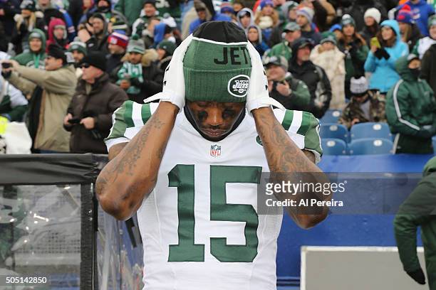 Wide Receiver Brandon Marshall of the New York Jets prepares before the game against the Buffalo Bills at Ralph Wilson Stadium on January 3, 2016 in...