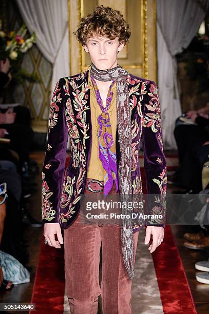 Model walks the runway at the Roberto Cavalli show during Milan Men's Fashion Week Fall/Winter 2016/17 on January 15, 2016 in Milan, Italy.