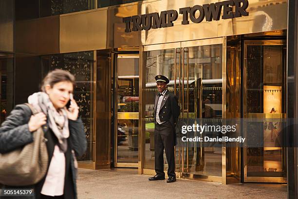 doorman at the trump tower - doorman stock pictures, royalty-free photos & images