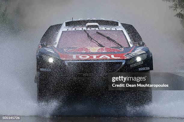 Sebastien Loeb of France and Daniel Elena of Monaco in the PEUGEOT 2008 DKR for TEAM PEUGEOT TOTAL compete on day 13 / stage twelve between San Juan...