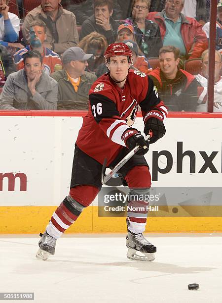 Michael Stone of the Arizona Coyotes passes the puck against the Edmonton Oilers at Gila River Arena on January 12, 2016 in Glendale, Arizona.