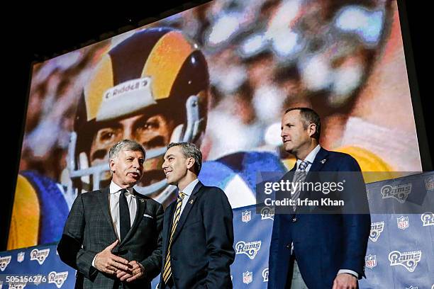 Los Angeles Rams owner Stan Kroenke, left, Rams CEO Kevin Demoff and Chris Meany of Hollywood Park Land Co. After the press conference at Forum to...