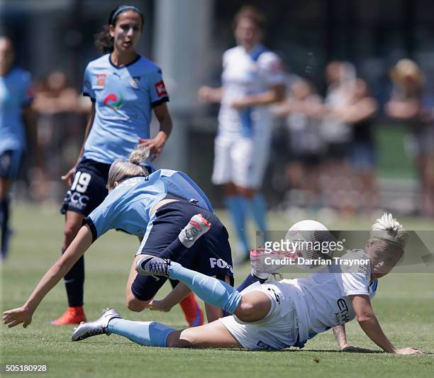 Jess Fishlock of Melbourne City challenges Alanna Kennedy of Sydney FC during the round 14 W-League match between Melbourne City FC and Sydney FC at...