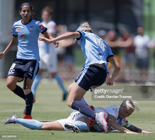 Jess Fishlock of Melbourne City challenges Alanna Kennedy of Sydney FC during the round 14 W-League match between Melbourne City FC and Sydney FC at...