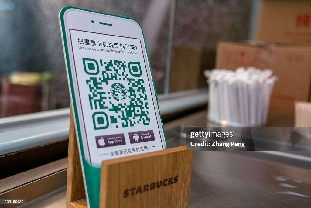 QR code is placed on the counter. Starbucks is expanding...
