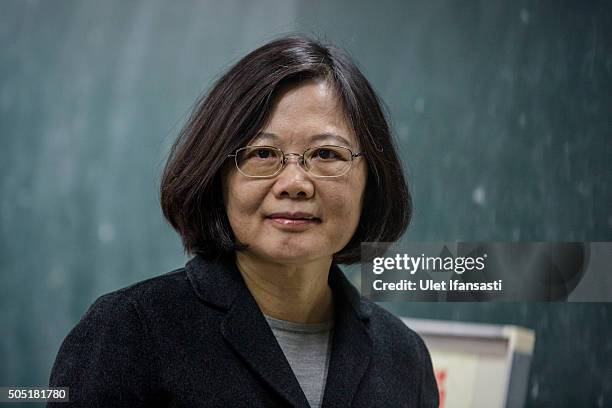 Democratic Progressive Party presidential candidate Tsai Ing-wen, poses to journalist after casting her ballot at a polling station on January 16,...