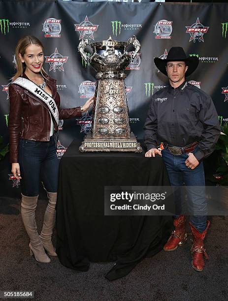 Miss USA 2015 Olivia Jordan and Professional Bull Rider Cody Nance attend the 2016 Professional Bull Riders Denim & Diamonds Party at Madison Square...