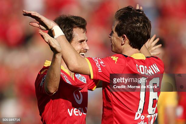 Craig Goodwin and Mate Dugandzic of Adelaide United celebrate a goal by Dugandzic during the round 15 A-League match between Adelaide United and the...