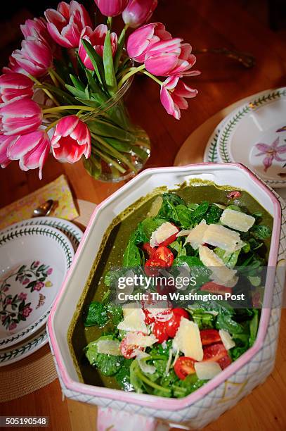 Lorraine Wallace cook's two soups from her new cookbook, "Mr. Sunday's Soups" in her Washington, DC home. The Italian Spinach Salad Soup is pictured.