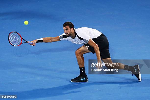 Grigor Dimitrov of Bulgaria plays a forehand in the mens final match against Viktor Troicki of Serbia during day seven of the 2016 Sydney...