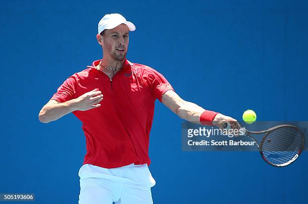 Kenny De Schepper of France plays a backhand in his match against Tim Smyczek of the United States during the third round of 2016 Australian Open...