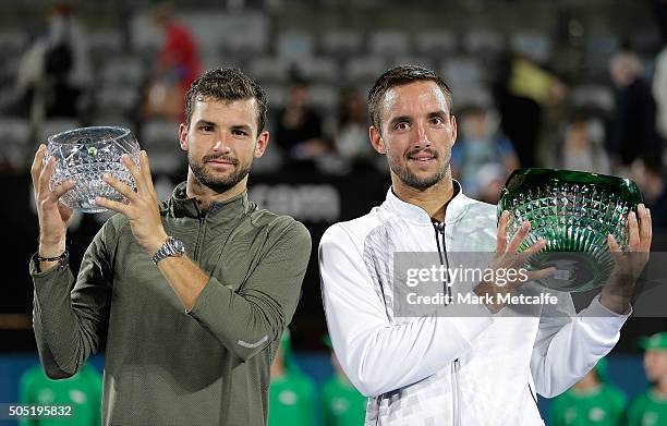 Viktor Troicki of Serbia poses with the winners trophy and Grigor Dimitrov of Bulgaria the runners up trophy after the men's doubles final during day...