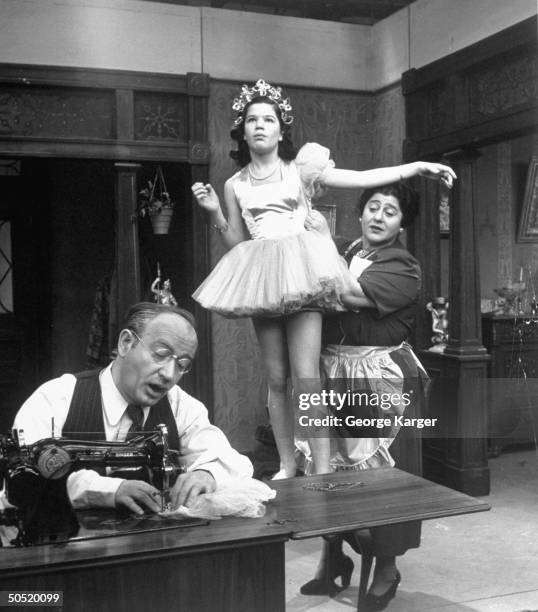 Actress & writer Gertrude Berg , actor Eli Mintz and actress Arlene McQuade performing in a scene of the TV program The Goldbergs.