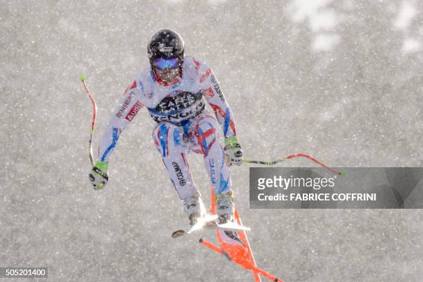 France's David Poisson competes the downhill race of the Alpine skiing FIS World Cup event on January 16, 2016 in Wengen.