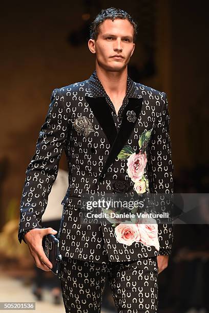 Model walks the runway at the Dolce & Gabbana show during Milan Men's Fashion Week Fall/Winter 2016/17 on January 16, 2016 in Milan, Italy.