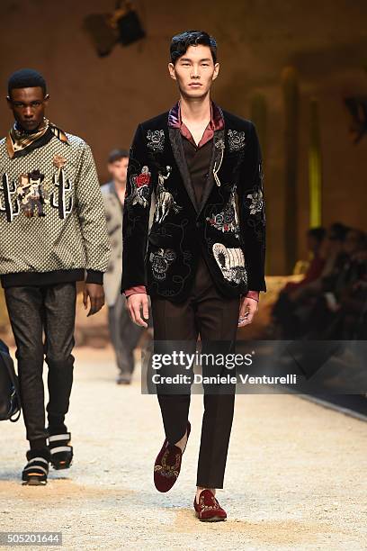 Model walks the runway at the Dolce & Gabbana show during Milan Men's Fashion Week Fall/Winter 2016/17 on January 16, 2016 in Milan, Italy.