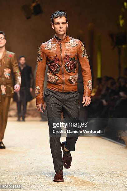 Model walks the runway at the Dolce & Gabbana show during Milan Men's Fashion Week Fall/Winter 2016/17 on January 16, 2016 in Milan, Italy.