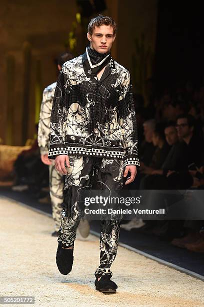 Model walks the runway at the Dolce & Gabbana show during Milan Men's Fashion Week Fall/Winter 2016/17 on January 16, 2016 in Milan, Italy.