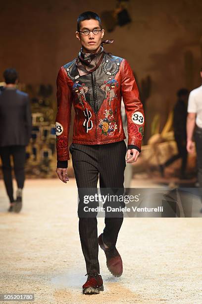 Model walks the runway at the Dolce & Gabbana show during Milan Men's Fashion Week Fall/Winter 2016/17 on January 16, 2016 in Milan, Italy.