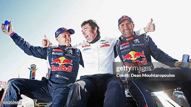 Stephane Peterhansel of France and Paul Jean Cottret of France in the PEUGEOT 2008 DKR for TEAM PEUGEOT TOTAL SOUTH AFRICA celebrate winning the...