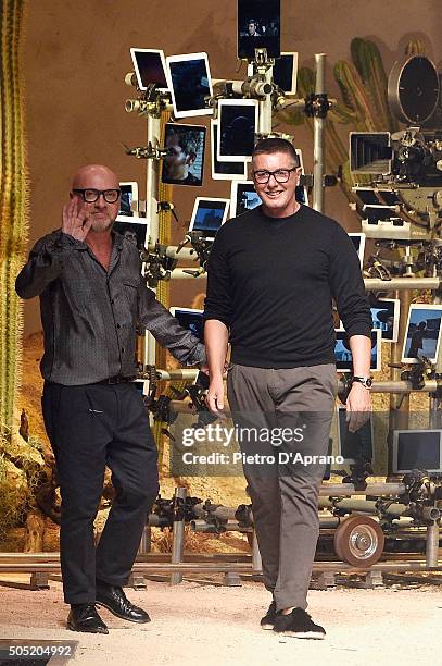 Designers Domenico Dolce and Stefano Gabbana walk the runway after the Dolce & Gabbana show during Milan Men's Fashion Week Fall/Winter 2016/17 on...