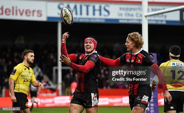 Gloucester fullback Rob Cook celebrates with Billy Twelvetrees after scoring the first try during the European Rugby Challenge Cup match between...