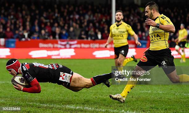 Gloucester fullback Rob Cook goes over for the first try during the European Rugby Challenge Cup match between Gloucester Rugby and La Rochelle at...