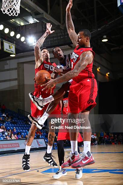 Russ Smith of the Delaware 87ers drives to the basket and passes the ball against the Toronto Raptors 905 on January 15, 2016 at Bob Carpenter Center...