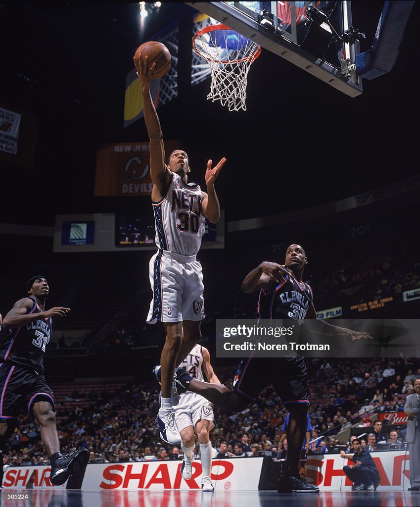 Kerry Kittles #30 of the New Jersey Nets attempts to shoot