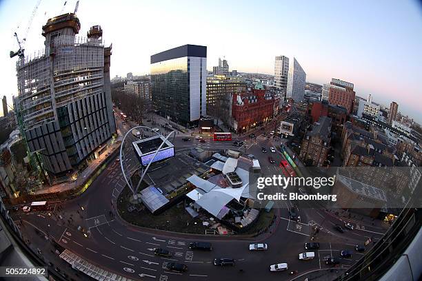 Traffic passes around the Old Street roundabout, also referred to as 'Silicon Roundabout,' in the area known as 'Tech City' in London, U.K., on...
