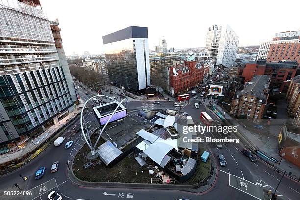 Traffic passes around the Old Street roundabout, also referred to as 'Silicon Roundabout,' in the area known as 'Tech City' in London, U.K., on...