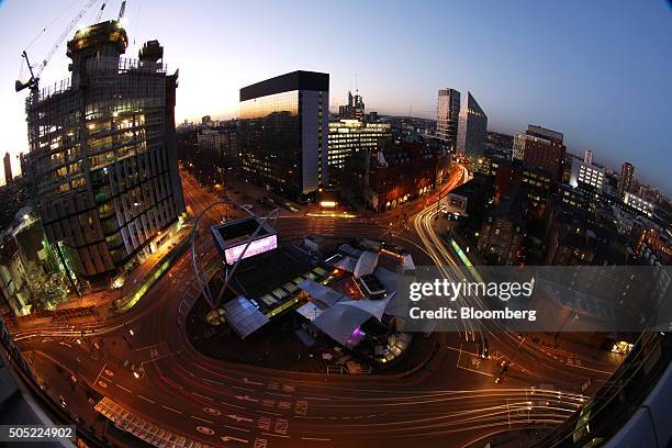 Light trails made by traffic passing around the Old Street roundabout, also referred to as 'Silicon Roundabout,' in the area known as 'Tech City' in...