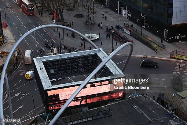 Giant illuminated advertising board stands on the Old Street roundabout, also referred to as 'Silicon Roundabout,' in the area known as 'Tech City'...