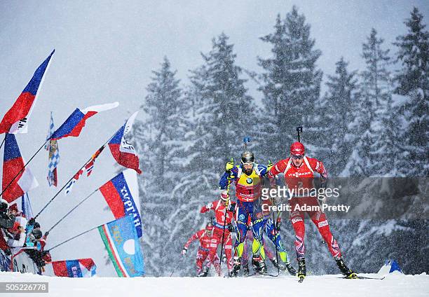 Tarjei Boe of Norway leads the pack on the first lap during the Men's 15km Biathlon race of the Ruhpolding IBU Biathlon World Cup on January 16, 2016...