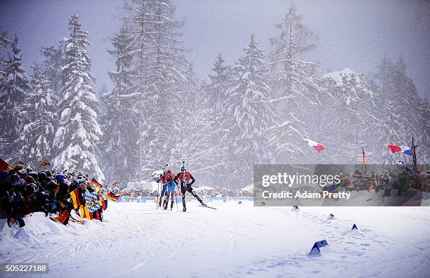 Erik Lesser of Germany chases down the leaders on his way to victory in the Men's 15km Biathlon race of the Ruhpolding IBU Biathlon World Cup on...